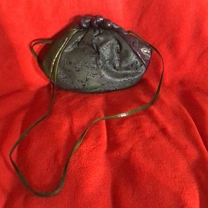 Purple and green clutch